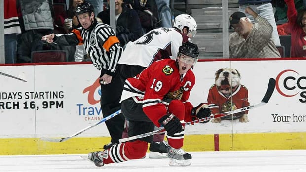 jon-toews-action-Bill-Smith-NHLI.jpg